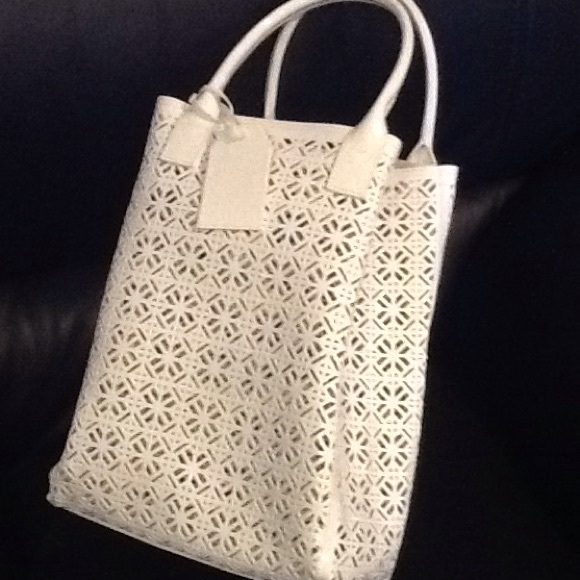 Tory Burch Handbags - Tory Burch "Limited Edition" white tote bag. NWOT.